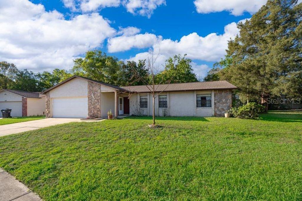 Photo of 612 Riverwoods Circle, Orlando, FL 32825 (MLS # O6392840)