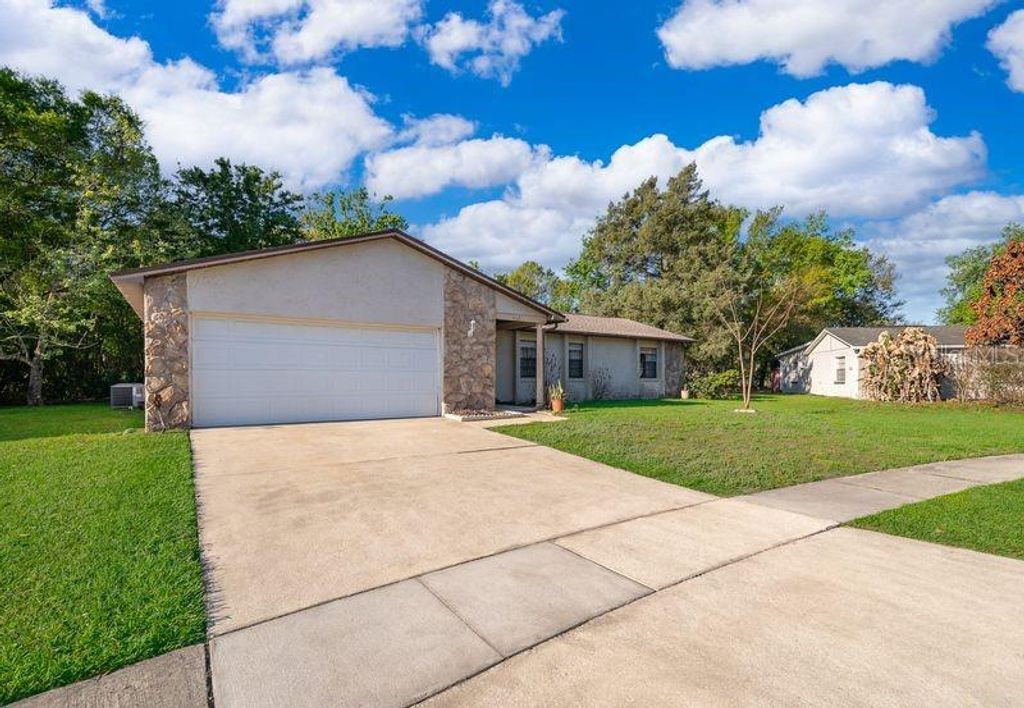 Photo of 612 Riverwoods Circle, Orlando, FL 32825 (MLS # O6392840)