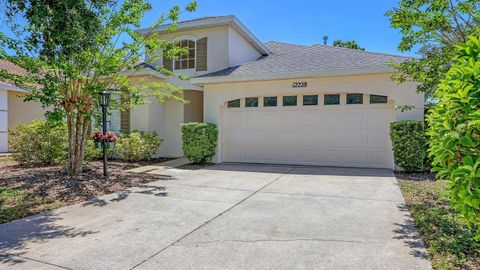 Photo of 12228 Winding Woods Way, Lakewood Ranch, FL 34202 (MLS # A4690320)