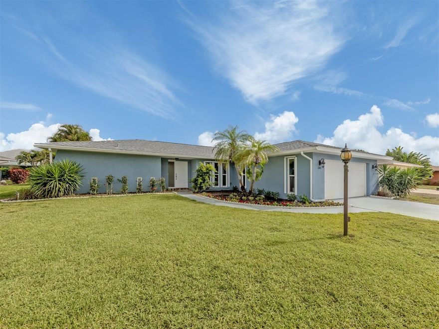One or more photo(s) has been virtually staged. Perfectly positioned just minutes from downtown Venice, pristine Gulf beaches, shopping, dining, and easy access to I-75, this remarkable home offers the ideal blend of location and lifestyle. Enjoy relaxed Florida living with a private, serene backyard featuring a screened lanai and large, sparkling pool, perfect for entertaining or unwinding in peace. Just outside the lanai, the patio area is ideal for grilling. This residence showcases inviting curb appeal with updated landscaping, a freshly painted interior and exterior, hurricane shutters, some new windows, and major updates including a new HVAC system and water heater in 2022. Step inside the foyer with coat closet into the spacious formal living and dining rooms, where abundant natural light highlights 24" x 24" travertine stone tile flooring throughout (with smaller tile in the bathrooms and no carpet anywhere). The expansive kitchen and dinette area features light wood cabinetry with pantry, stone countertops, tile backsplash, a large single-basin sink, and a full suite of appliances including oven, range, and microwave, designed for both everyday functionality and effortless entertaining. The home offers three bedrooms and two bathrooms, along with a large light-filled bonus room with a closet (featuring shelving and views of the lanai and pool), providing flexible space for a home office, media room, or possible fourth bedroom. The spacious primary bedroom has a walk-in closet and ensuite bath, the second bedroom includes a walk-in closet and adjoining bathroom, while the third bedroom is perfect for family or guests. The laundry room offers added convenience with a utility sink, cabinetry, and washer and dryer. Completing the home is a two-car attached garage with a newly finished epoxy floor. Whether you're seeking a full-time residence or seasonal retreat, this home delivers comfort, convenience, and style in a prime location.