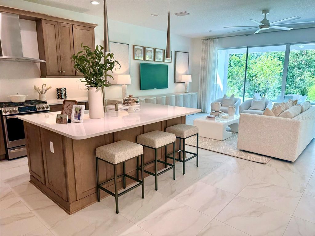 Photo of 3590 Malta Avenue, Wesley Chapel, FL 33543 (MLS # TB8410754)