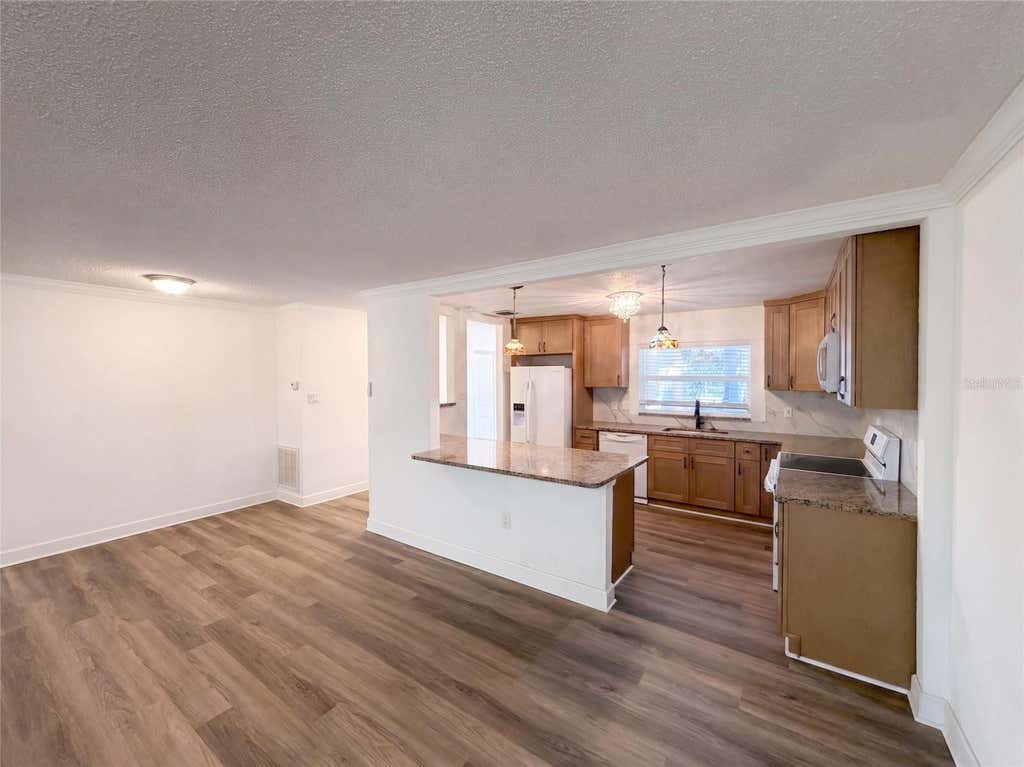 Photo of 5122 Bay Boulevard, Port Richey, FL 34668 (MLS # O6435777)