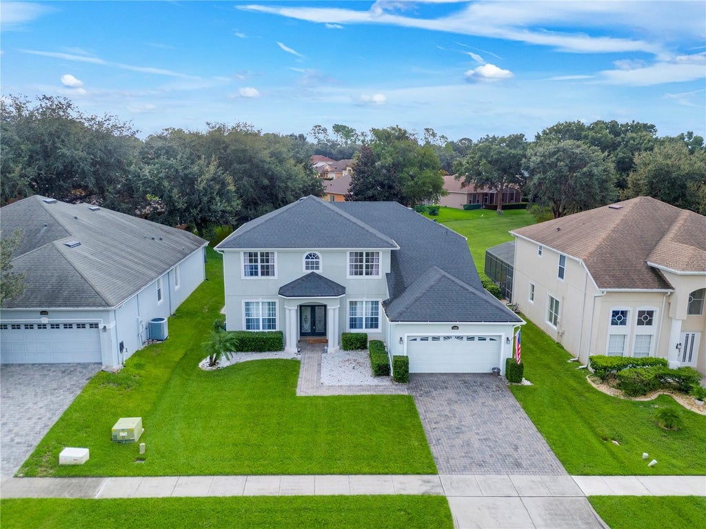 Photo of 1405 Misty Glen Lane, Clermont, FL 34711 (MLS # TB8546012)