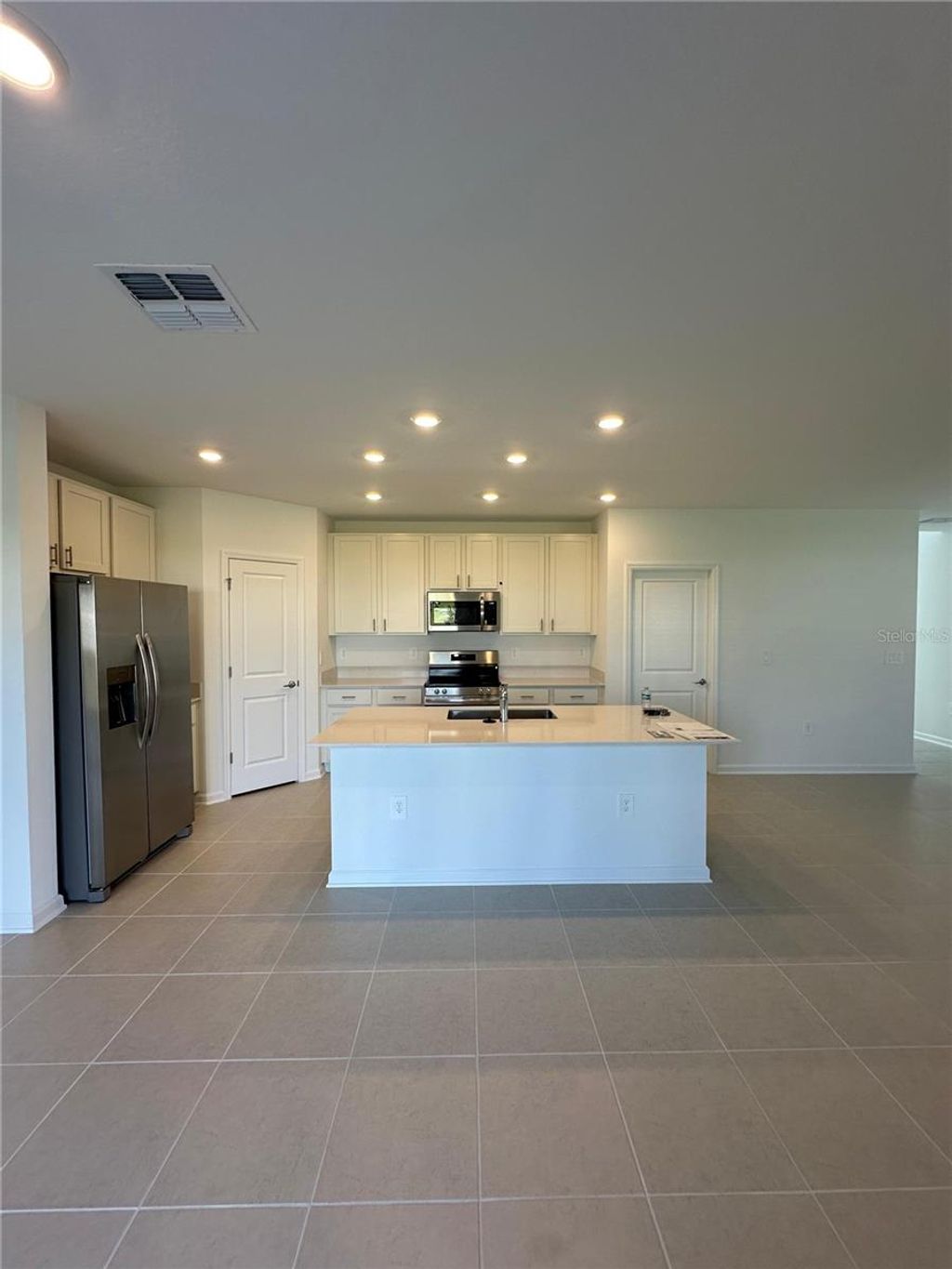 Photo of 5657 Portico Pl, Kissimmee, FL 34758 (MLS # O6358602)