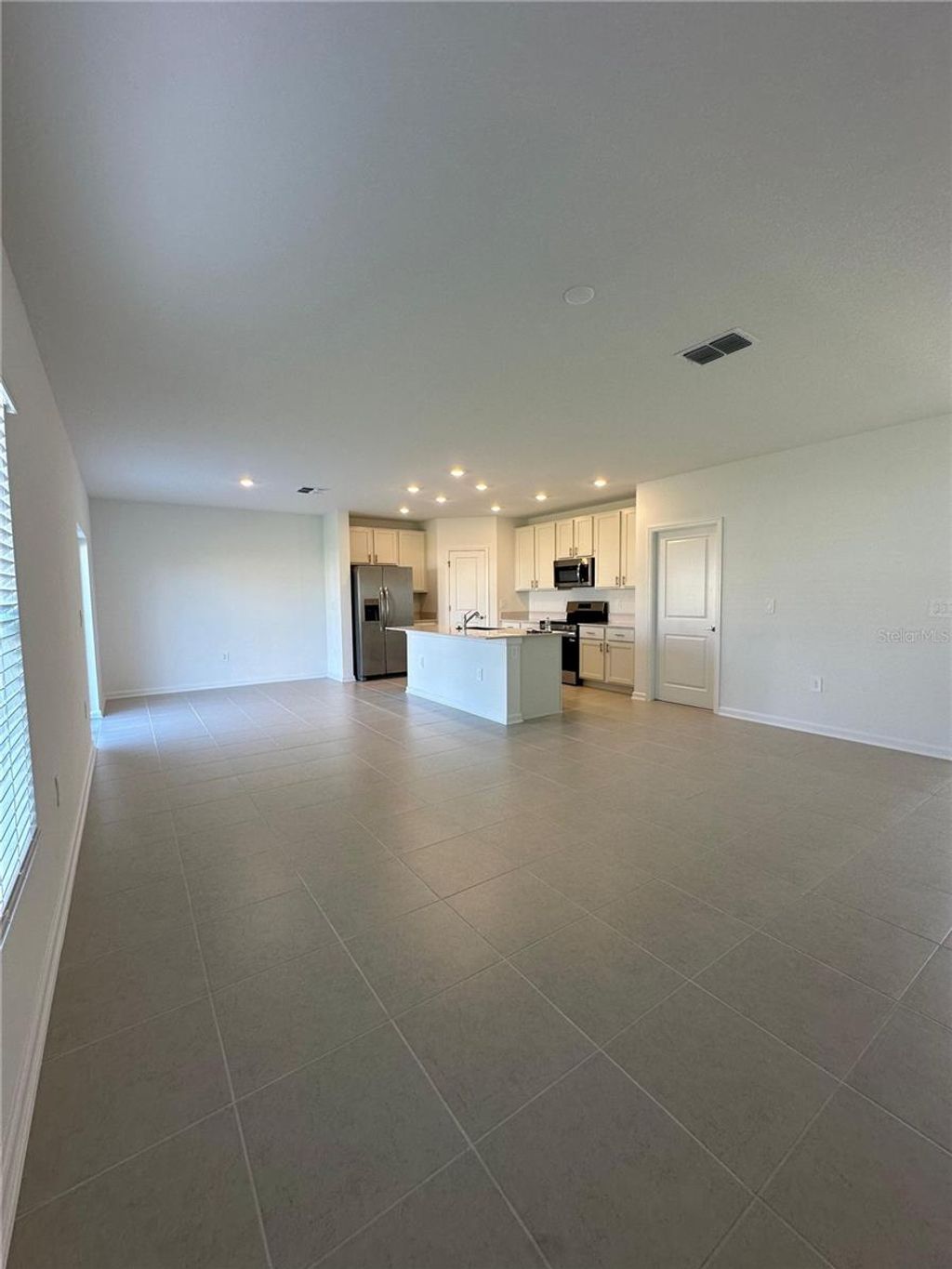 Photo of 5657 Portico Pl, Kissimmee, FL 34758 (MLS # O6358602)
