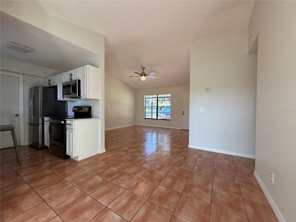 Photo of 7320 Anstead Circle, Orlando, FL 32810 (MLS # O6407893)