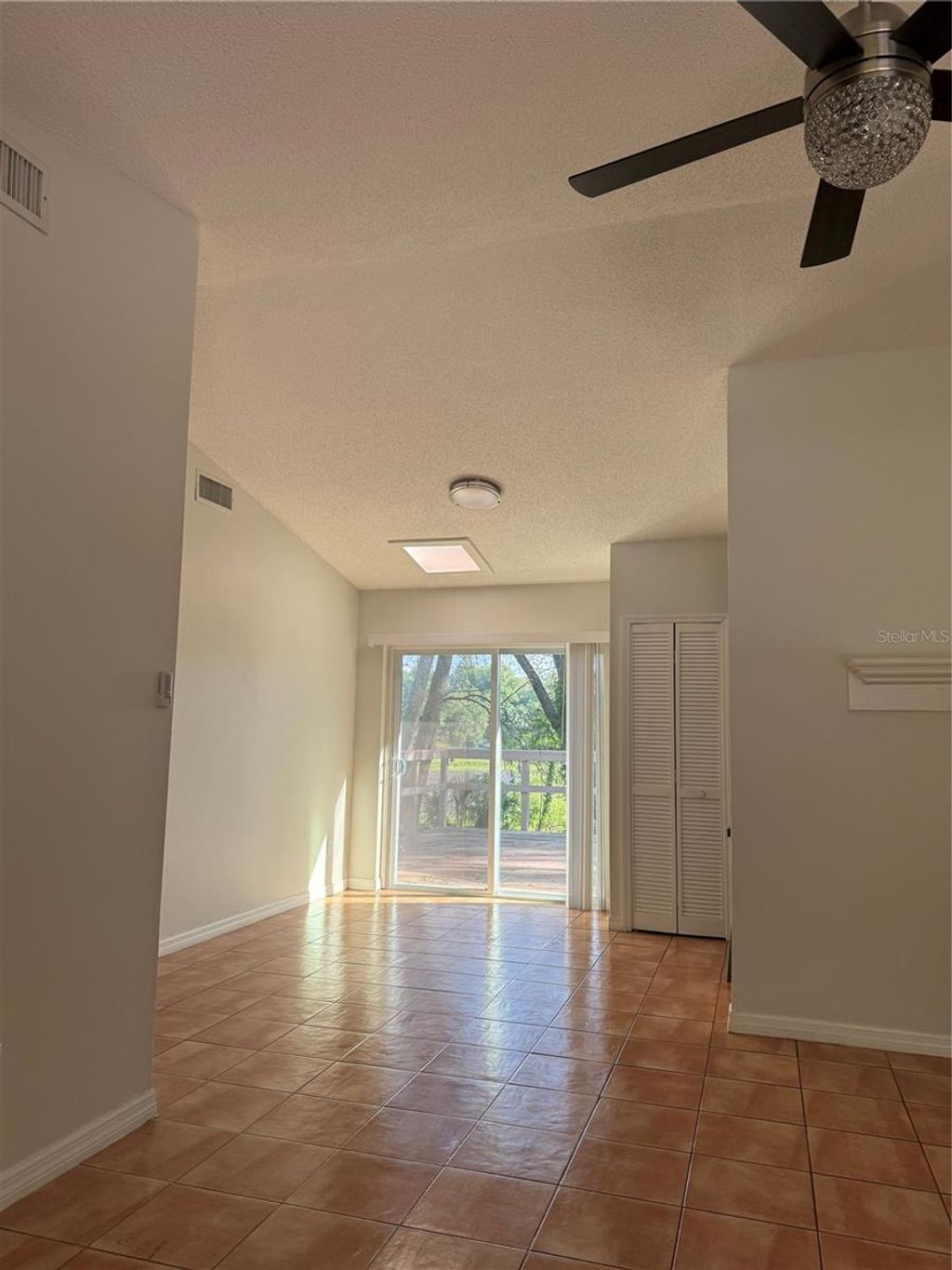 Photo of 7320 Anstead Circle, Orlando, FL 32810 (MLS # O6407893)