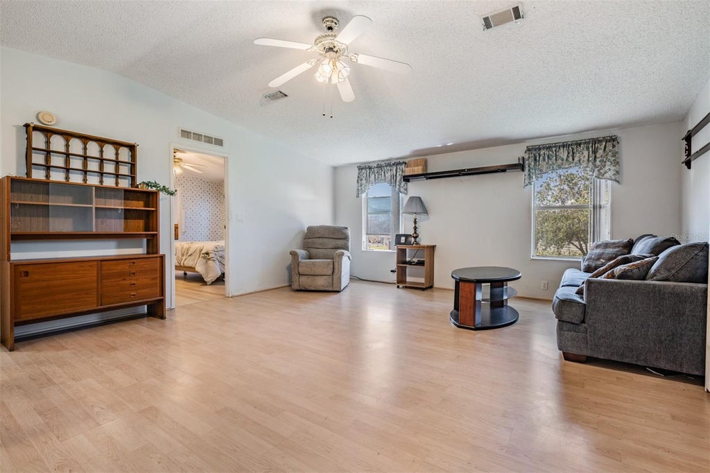 Photo of 37700 Neukom Avenue, Zephyrhills, FL 33541 (MLS # TB8554537)