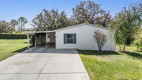 Photo of 37700 Neukom Avenue, Zephyrhills, FL 33541 (MLS # TB8554537)
