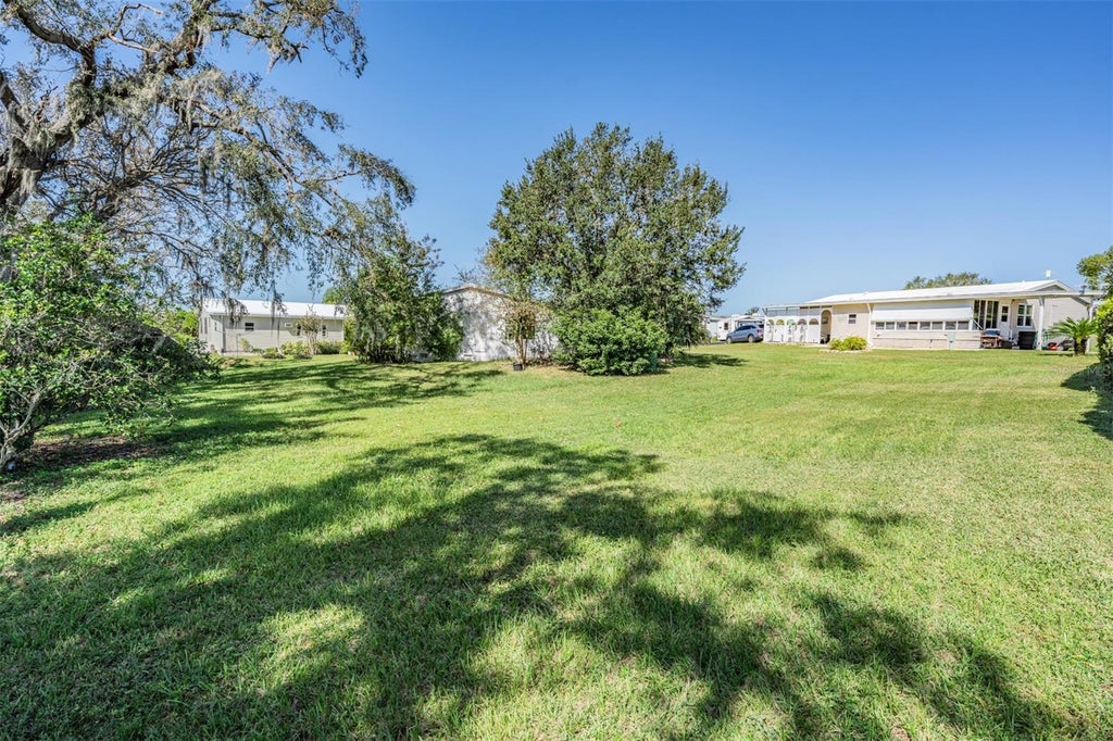 Photo of 37700 Neukom Avenue, Zephyrhills, FL 33541 (MLS # TB8554537)