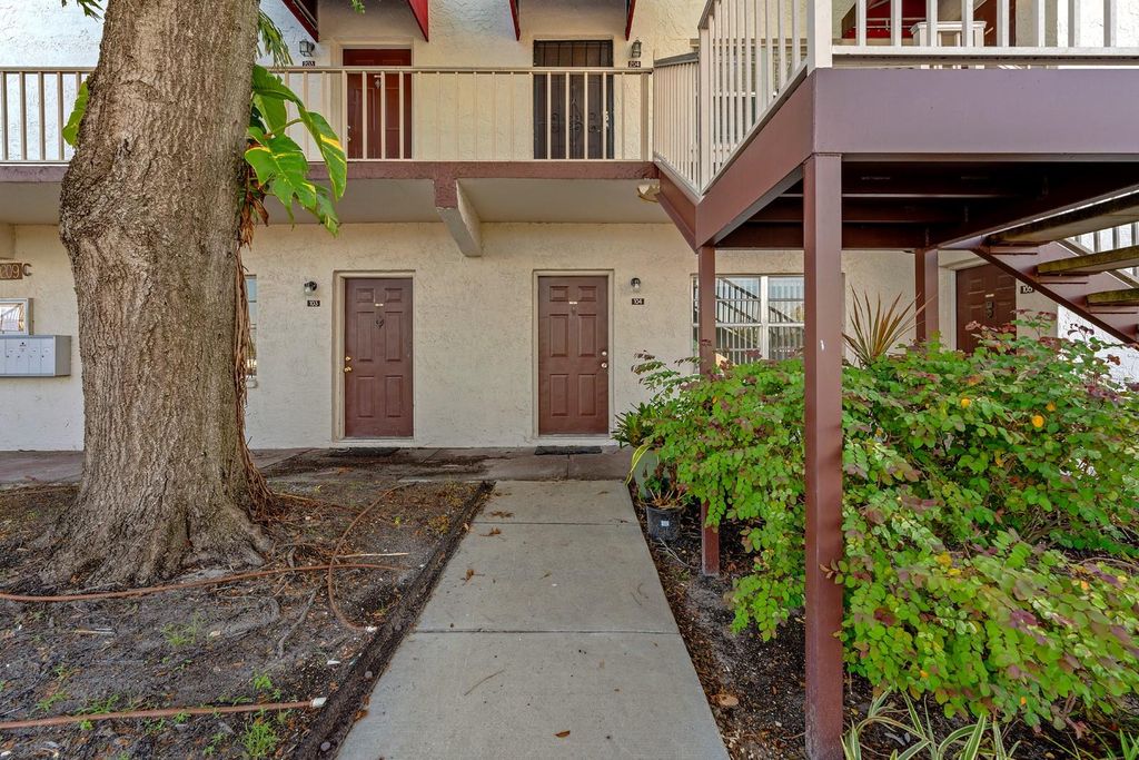 Photo of 9209 Tudor Drive #C104, Tampa, FL 33615 (MLS # TB8408519)