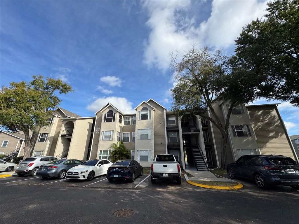 Photo of 4740 Walden Circle #1035, Orlando, FL 32811 (MLS # O6379995)