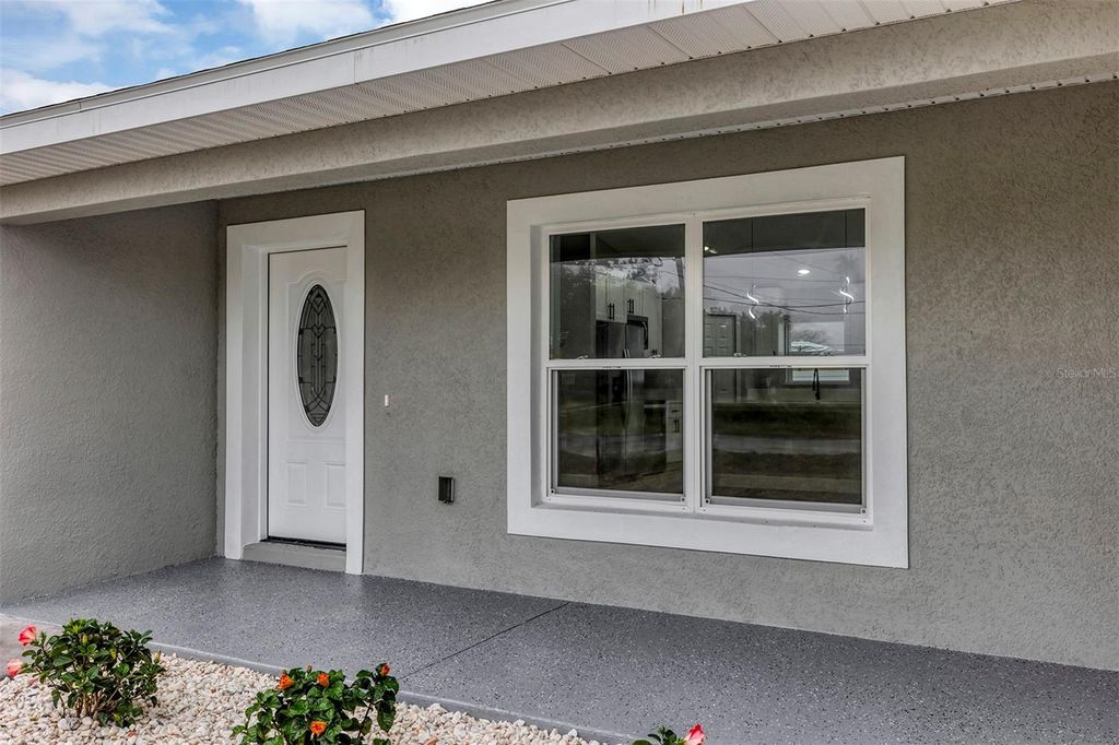 Photo of 14958 SW 32nd Place, Ocala, FL 34481 (MLS # OM719135)