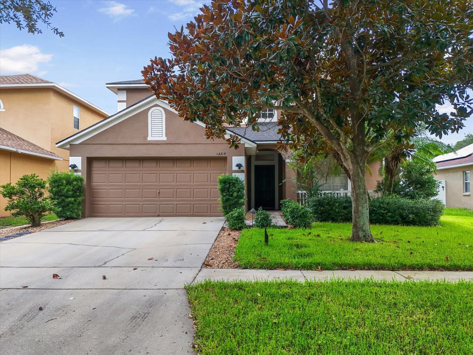 There’s something special about coming home to a place that feels like a retreat. In this Panther Trace luxury pool home in the sought-after Tampa suburb of Riverview, you don’t just get a house—you get your own piece of Florida paradise, tucked behind a welcoming covered front porch and surrounded by spaces made for gathering, playing, and relaxing. Freshly painted inside and out, this home has been lovingly maintained and thoughtfully updated. The roof was replaced in 2020, and recent upgrades like a new water heater and microwave in 2024—plus clean four-point and wind mitigation inspections from April 2025—mean you can move in with confidence. Best of all, the property does not require flood insurance and comes with a low HOA, giving you peace of mind and keeping monthly costs manageable.
Step inside and you’ll notice the elegant details right away—a soaring atrium entrance with crown molding that adds a touch of sophistication, a wood-railed staircase that draws the eye, and a fireplace that makes the family room feel instantly inviting. The kitchen is the heart of the home, designed for both everyday living and entertaining. Abundant storage comes from 42-inch wood cabinets with crown molding, there’s plenty of counter space for cooking and baking, and a window over the sink frames a beautiful view of the pool and backyard. A butler’s pantry and walk-in pantry keep everything organized, while the open flow into the dining and living spaces makes it easy to host everything from Sunday pancakes to holiday dinners. In the mornings, the east-facing covered front porch is the perfect spot for coffee with sunrise views. In the evenings, slide open the doors to your backyard and the real magic begins. The west-facing screened pool offers spectacular Florida sunsets, while the fully fenced yard is perfect for pets and playtime. A bocce ball court adds a fun, low-maintenance feature that’s ideal for casual fun with friends or a weekend competition. The layout works beautifully for both daily life and entertaining. On the first floor, you’ll find a spacious great room, formal dining room, office/den/flex space, and a pool bath. Upstairs features four spacious bedrooms and two full bathrooms. The primary suite is a private escape with two walk-in closets—one with a dedicated laundry space—a dual-sink vanity, glass-enclosed shower, and an acrylic spa tub. Living in Panther Trace means you’re part of a vibrant, active Riverview community in one of the most desirable neighborhoods. You’ll have access to a resort-style pool, tennis courts, volleyball courts, playgrounds, walking trails, and the top-rated Collins PK-8 School. Families love the year-round calendar of neighborhood activities, from outdoor movie nights and seasonal holiday events to fitness classes and family festivals. Nearby, you’ll find some of the area’s most popular destinations—Apollo Beach Nature Preserve, the Manatee Viewing Center, Spurlino Family YMCA, The Alley, Triple Creek Nature Preserve plus dining, entertainment, and top rated healthcare including newer hospitals like St. Joseph's South, Advent Health Riverview, and the VA Clinic. All appliances, window treatments, and even the dinette set stay with the home, making your move effortless. And with no hurricane damage or flooding, you can simply unpack and start enjoying the Florida lifestyle you’ve been dreaming about. This is more than a home—it’s the place where your next chapter begins.