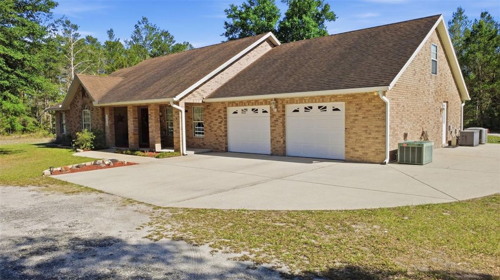 Photo of 1640 Red Dog Road, De Leon Springs, FL 32130 (MLS # V4948584)