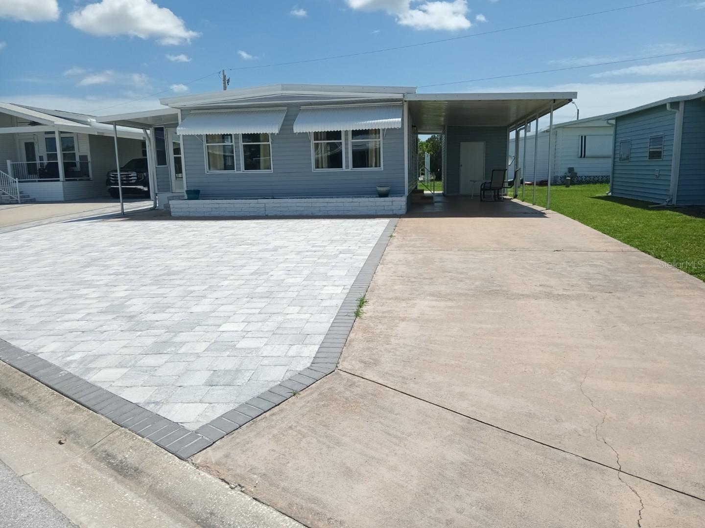 Tri-par Estates in an active, vibrant 55+ community where each property is individually owned with a deed and titles to the home, NO LOT RENT! Beautifully remodeled, this bright, modern home is a gem! The gorgeous pavers in front create extra parking for your guests, walls are drywall, freshly painted throughout, new appliances, windows in the front, updated bathroom, and luxury vinyl floors throughout. The shed provides extra storage and also houses the new washer dryer. We have many amenities here such as a large pool, spa, palapa tiki hut, pickleball courts, fitness center, shuffleboard, miniature golf, horseshoes, game rooms for ping-pong, billiards and more. The clubhouse is host to events such as dinners, dances, meetings, and church services. Great location to downtown Sarasota, marinas, shopping, dining, Sarasota airport, museums and of course our world-famous beaches! You own your own land in this special parks and recreation district, and pay not HOA fee directly to the association. The annual amount of $1,584 is included in your property taxes. Golf cart-friendly community with optional storage for your R/V or boat.