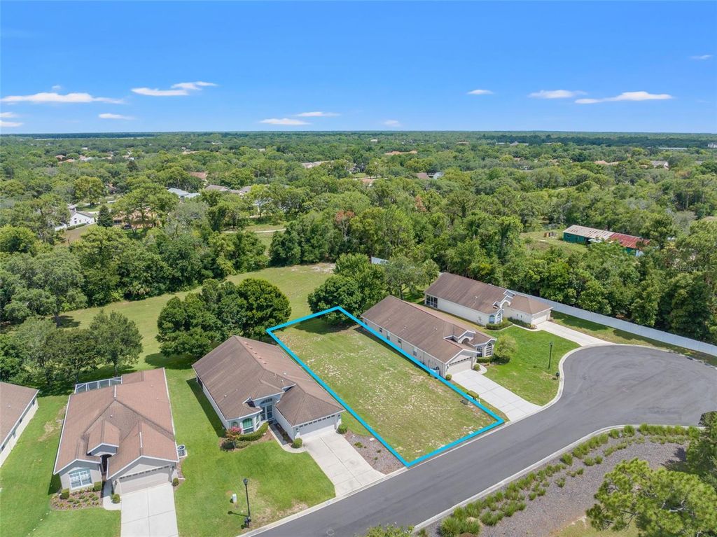 Photo of 10978 Westerly Drive, Spring Hill, FL 34609 (MLS # TB8440403)