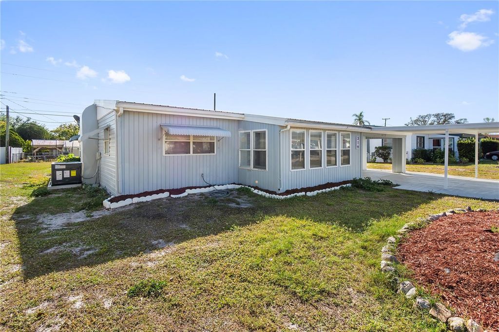 Photo of 319 Thomas Avenue, Frostproof, FL 33843 (MLS # P4936331)