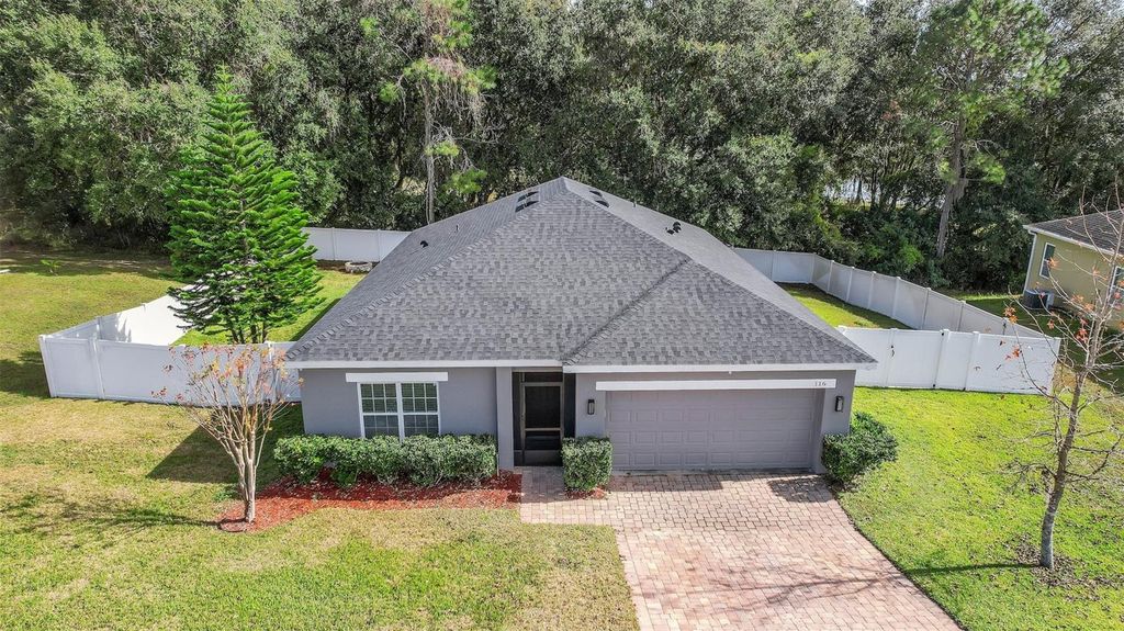 Photo of 116 Islabella Way, Groveland, FL 34736 (MLS # O6373422)