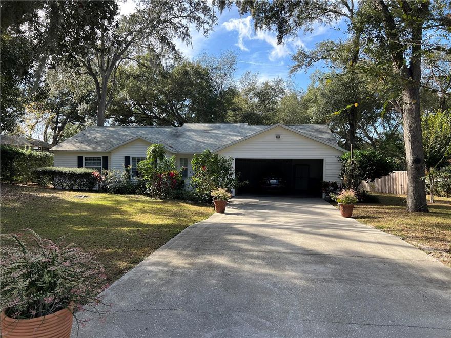 FURNISHED Move-In Ready Home on Spring Lake!! NO HOA!! Welcome to 36338 W Spring Lake Blvd, where comfort, charm, and serene lakefront views come together in perfect harmony. This beautiful 3-bedroom, 2.5-bath home is truly move-in ready and offers the best of Florida living year-round. Step inside and enjoy cozy evenings by the wood-burning fireplace in the spacious living room, or take in the peaceful surroundings from your enclosed lanai, which overlooks a lush, natural backyard leading right to beautiful Spring Lake. The spacious kitchen is a chef’s delight, featuring stainless steel fridge and dishwasher, washer and dryer, ample cabinet and counter space, a casual eat-in area, and a convenient laundry space—making everyday living a breeze. The private main suite offers a relaxing retreat with dual sinks, a separate tub, and a walk-in shower. This property is just minutes from The Villages, one of the nation’s premier active adult communities, offering world-class golf courses, dining, shopping, live entertainment, and endless recreation. Don’t miss your chance to see your new home!!