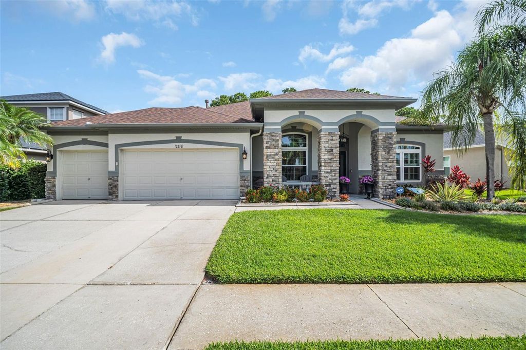 Photo of 12918 Tar Flower Dr, Tampa, FL 33626 (MLS # TB8395681)