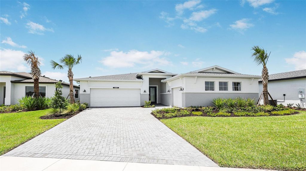 Photo of 14447 Coastal Woodland Lane, Parrish, FL 34219 (MLS # W7885068)