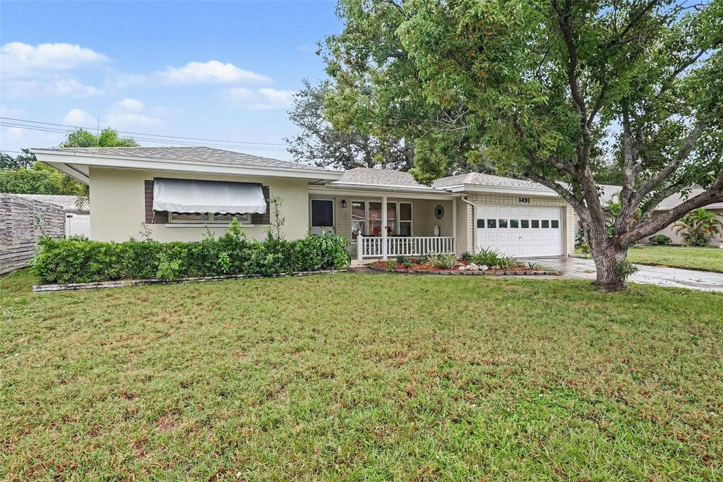 Photo of 1491 San Helen Dr, Dunedin, FL 34698 (MLS # TB8556002)