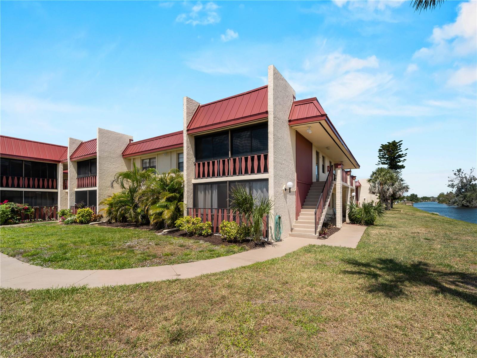 Peaceful water views, two pools, and access to kayak storage, tennis, and pickleball—this 1-bedroom Rotonda West condo is the perfect seasonal retreat or smart investment.
Located on the first floor with morning sun and serene surroundings, it’s your chance to own a low-maintenance slice of Southwest Florida.
Step into a slice of Floridian paradise with this charming 1-bedroom, 1-bathroom haven in Rotonda West. This cozy retreat offers inviting living space—perfect for a snowbird seeking a seasonal escape, a first-time buyer starting their journey, or an investor looking for a solid opportunity.
Enjoy morning swims in one of the two pools, one of which is heated for the cooler months. Kayak enthusiasts will appreciate on-site storage, while sports lovers can take advantage of the tennis and pickleball courts. The community itself boasts a rich history, having once been featured on ABC’s Superstars competition in the 1970s.
The first-floor unit enjoys eastern exposure, capturing beautiful morning sunlight and offering serene water views of the Rotonda River. Picture yourself starting the day with coffee in the peaceful courtyard entrance, surrounded by lush nature. For added convenience, the unit is located right next to the laundry facility.
From its prime location in Rotonda West, you're just minutes from five golf courses perfect for beginners and seasoned players alike. Spend your afternoons fishing along scenic canals or enjoying leisurely bike rides and walks on nearby trails. When you're ready for a little excitement, shopping, local events, and pristine beaches are all just a short drive away. Public boat marinas are also close by, inviting you to explore the area by water.
Inside, the light and airy living room is framed by a welcoming neutral palette, with cozy carpet underfoot and sliding glass doors that flood the space with natural light. Step outside to your private lanai, where you can relax and take in the verdant surroundings.
The bathroom is both practical and timeless, featuring soft beige tones, a functional vanity, and a cohesive tile design. The vintage kitchen offers a classic U-shaped layout and light cabinetry, making it easy to whip up your favorite home-cooked meals.
This meticulously cared-for property blends historic charm with modern-day convenience. Whether you're seeking a personal getaway or a prime investment, Unit 226 at 72 Boundary Blvd is ready to welcome its next chapter.
Reach out today to experience all this fabulous property has to offer!
