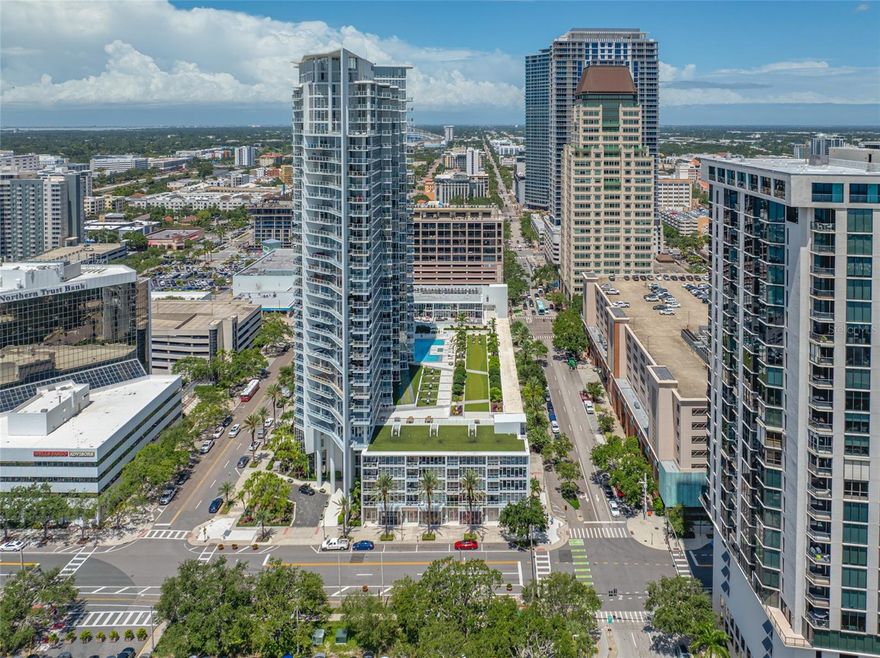 Under contract-accepting backup offers. Welcome to Urban Living at Its Finest in the Iconic Signature Place
Located in the heart of vibrant downtown St. Petersburg, Signature Place is a 34-story luxury condominium building featuring 243 residential units. Experience unparalleled sophistication in this stunning 2-bedroom, 2-bathroom condo spanning 1,269 square feet on the 25th floor. Step out onto your private balcony and take in amazing, panoramic views of Albert Whitted Airport, the Yacht Harbor, Sailing Center, the new Pier, Tampa Bay, and the city skyline.
This thoughtfully designed split floor plan is filled with natural light and features 10-foot floor-to-ceiling windows in all exterior rooms, including a sliding glass door in the living area. The modern kitchen is equipped with high-end Thermador appliances and granite countertops, perfect for culinary enthusiasts.
The spacious primary bedroom includes a large walk-in closet. The second bathroom is conveniently accessible from the main living area, ideal for guests. A full-sized in-unit washer and dryer are included in a dedicated laundry area for your convenience.
Additional features include two assigned parking spaces in the under-building garage on the third floor, along with a private storage unit also located on the third floor.
Signature Place offers exceptional amenities including a staffed management office and building engineer on weekdays, a 24/7 front desk attendant, two stylish community rooms with one featuring a pool table, a state-of-the-art fitness center, a resort-style pool deck with spa, and a secured package delivery room with on-site attendant.
You are just steps away from Beach Drive, top-rated restaurants, the Mahaffey Theater, Dali Museum, city marina, waterfront parks, Palladium Theater, arts venues, Tropicana Field, major highways, and Tampa International Airport.
Whether you are looking for a full-time residence, a luxurious second home, or an outstanding investment opportunity, this condo offers the best of downtown living.
Schedule your private showing today and make this exceptional residence your new home. Live where others vacation. Signature Place is calling.