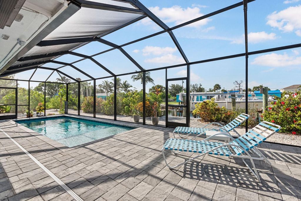 Photo of 1030 Haste Lane, Englewood, FL 34223 (MLS # D6142906)