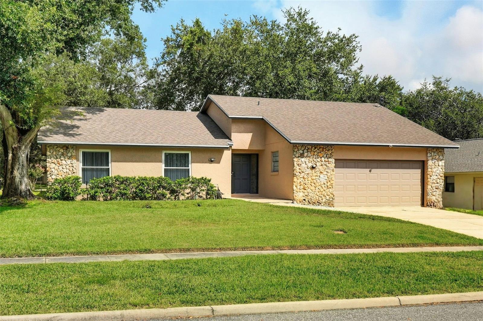 THIS IS A MUST SEE!!! This is a SPACIOUS beautifully designed 3-bedroom, 2-bathroom home sitting on a LARGE corner lot. The floor plan is spacious and inviting. The home boasts many upgrades including master bathroom, all toilets, new water heater, all new plumbing, upgraded electrical, new sliding glass doors, new windows and all new window shades. The large living room with a fireplace in the highly sought after neighborhood of Wekiva has a nearby playground, lakes, trails and so much more! INCLUDED: backyard shed, surround sound entertainment system, refrigerator, brand new oven. Other furniture available for purchase: Large sectional sofa, dining room table and small furniture pieces.