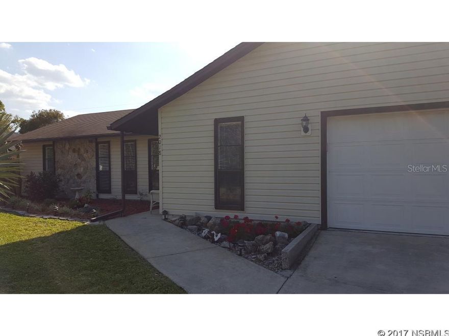 Immaculate home with beautiful stone fireplace & a huge flex room that could easily be a 3rd bedroom. Lots of upgrades include granite counter tops, newer appliances incl. water heater, walk-in closets, drywood & sub termite treatments, hurricane shutters, irrigation system with well, new roof in 2005 & ac in 2009. Beautiful back yard a large shed, peach, orange & banana trees. Definitely a must see! ;Water: City