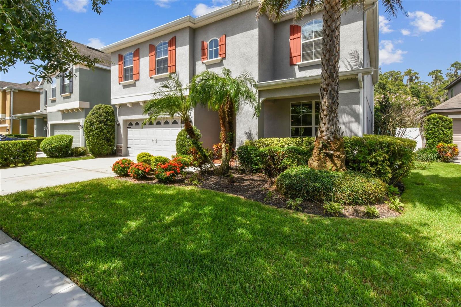 Here’s your chance to own a piece of one of Tampa’s most desirable zip codes. This beautifully maintained and thoughtfully designed home offers expansive living spaces perfect for everyday comfort, unforgettable celebrations, and everything in between. Step inside to an inviting open floor plan with high ceilings and a striking spindle staircase that creates an elegant first impression. A spacious formal living room sets the stage for conversation and connection. From there, the great room, dining area, and kitchen command attention, filled with generous natural light and offering plenty of space to accommodate gatherings of any size. On the first level, you’ll also find a large bedroom and full bathroom, ideal for use as a home office, yoga studio, or a guest suite. Upstairs, the expansive private owner’s suite is everything you’ve been looking for, featuring a spa-inspired ensuite with a soaking tub, separate shower, dual vanities, and two walk-in closets. It’s the perfect retreat from the demands of everyday life. A huge, versatile bonus room offers endless possibilities. Whether you envision a sixth bedroom, home gym, game room, or movie theater, this space is ready to be tailored to your family’s lifestyle. Three additional large bedrooms and a full bathroom complete the second floor. Outside is your personal backyard escape, where a screened-in patio invites you to soak up the Florida sunshine, enjoy peaceful mornings, or host unforgettable barbecues with family and friends. Situated in the K-Bar Ranch community, you’ll enjoy convenient access to top-rated schools, shopping, dining, entertainment, and major highways.
Don’t miss your chance to make this exceptional home yours. Schedule your private tour today.