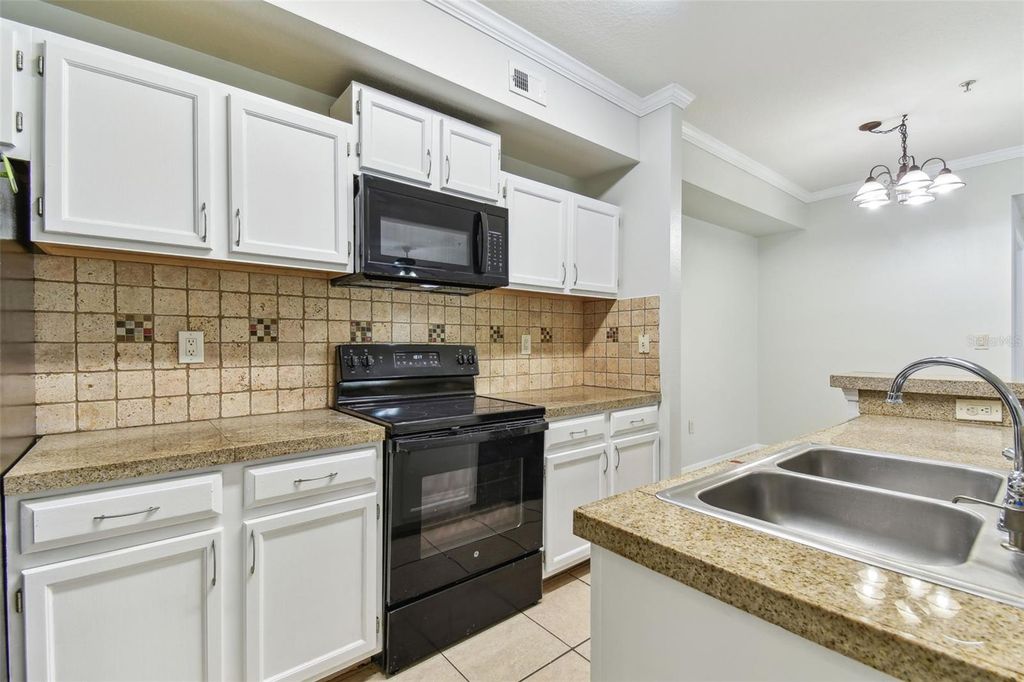 Photo of 5606 Pinnacle Heights Circle #304, Tampa, FL 33624 (MLS # TB8333999)