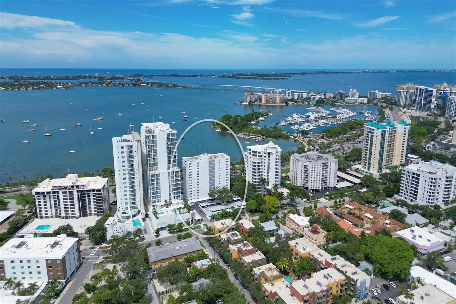 Enjoy the captivating panoramic views to the west and north from this modern-style 8th-floor condo in the heart of downtown Sarasota. The two-bedroom/two-bath home was completely remodeled with wooden and tile floors, hurricane windows, new light fixtures, stainless steel appliances, and stone countertops. The kitchen, dining area, and living room are designed as open spaces and give the condo a loft-like feel. Royal St. Andrews offers security, an on-site manager, a fitness center, a heated pool, assigned parking, guest parking, and a great location in the heart of Sarasota, just across from Marina Jack. Immerse yourself in the active social lifestyle that is downtown. Whole Foods, the Theatre and Opera, and excellent restaurants are just around the corner. Walk to the Farmers Market, Selby Gardens, or Burns Court. This prime location is close to every cultural event the city offers. It is only minutes to St. Armand’s Circle, Longboat Key, and your choice of Sarasota's attractive golf courses and beaches.