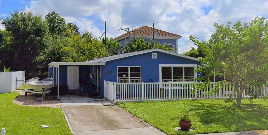 *Highest & Best by 12/05* Welcome to this charming two-bedroom, two-bathroom home that perfectly balances comfort and practicality. Recent updates include a new roof, ensuring peace of mind for years to come. The heart of the home features a well-appointed kitchen with stainless steel appliances, beautiful solid wood cabinets, and a convenient breakfast bar, perfect for morning coffee or casual dining. Recessed lighting illuminates the space while laminate flooring flows seamlessly throughout the interior. Step outside to discover your own private oasis with a screened-in lanai ideal for enjoying Florida's year-round sunshine without the bugs. The expansive backyard offers endless possibilities, complete with a practical storage shed and secure four-foot fencing for privacy and safety. Whether you're hosting barbecues, gardening, or simply relaxing, this outdoor space delivers. Located in a welcoming neighborhood, this home combines modern conveniences with thoughtful design elements. The laminate floors make maintenance a breeze, while the generous yard space provides room for outdoor activities and future landscaping dreams. Schedule your tour now. No assignable contracts.