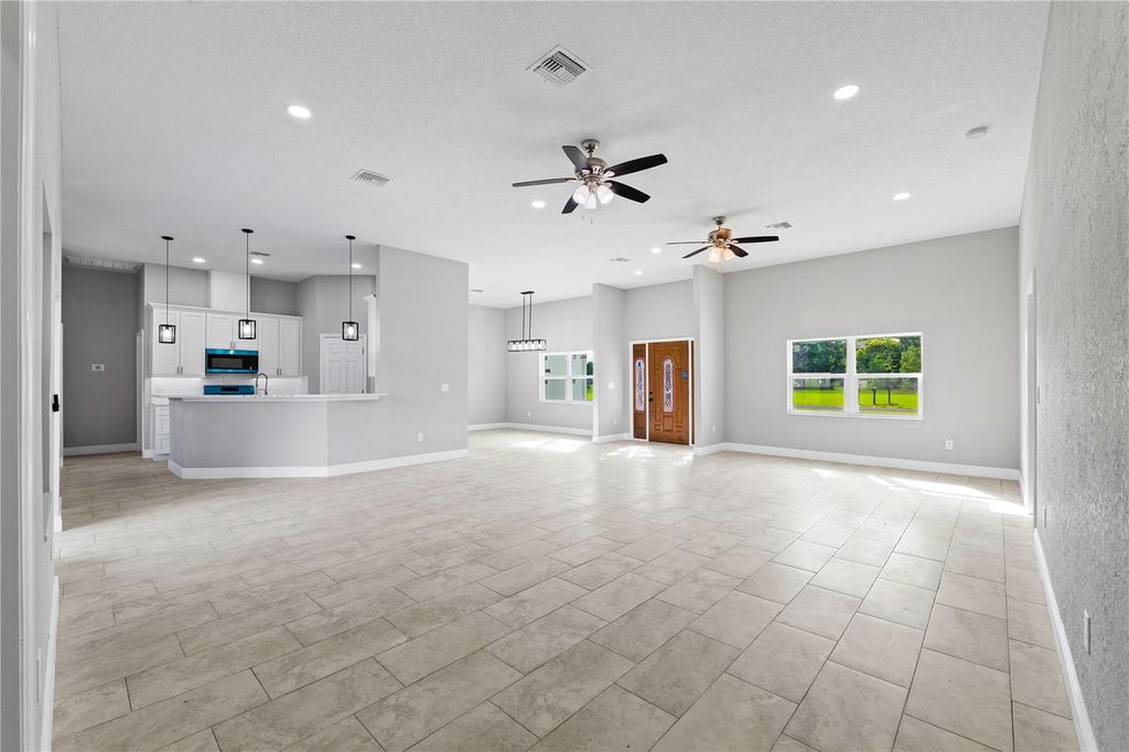 Photo of 4009 Ernest Drive, Wesley Chapel, FL 33543 (MLS # TB8394030)