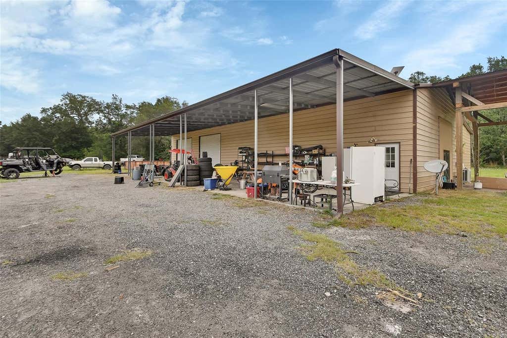 Photo of 4940 State Road 11, De Leon Springs, FL 32130 (MLS # V4949576)