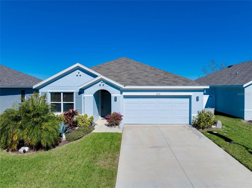 Built in 2022 with solid concrete block construction, this thoughtfully upgraded one-story DR Horton Aria floor plan offers peace of mind and modern comfort.  The open-concept living, dining, and kitchen layout is ideal for everyday living and entertaining.  Tile flooring runs throughout the main areas with carpeted bedrooms for added comfort.  The kitchen features upgraded granite countertops, ample cabinetry, pantry storage, and high quality fixtures, along with blinds and ceiling fans throughout the home.  The spacious primary suite includes dual sinks, his-and-her closets, and a well-appointed bath with large tile finishes. Enjoy outdoor living on the extended covered and screened paver lanai, complete with custom hurricane fabric, upgraded lighting, and a dedicated paver grilling pad—perfect for relaxing or hosting family and friends.  Additional upgrades include whole-yard irrigation with rear drip line, epoxy-coated garage floors, garage overhead storage racks and shelving, plus added laundry room cabinetry to cover all your storage needs.  Located in the gated Glen Creek community, residents enjoy resort-style amenities including a clubhouse, swimming pool, outdoor kitchen, playground, and dog park all included in the impressively low quarterly HOA fees of $275.  Conveniently situated near all that Lakewood Ranch has to offer, including UTC Mall, medical facilities, downtown, beaches, shopping, dining, and schools, with easy access to US-301 and I-75.  Added bonus: Mixon Farm, located directly across the street, has been officially announced as a future public park featuring a library, community gardens, playground, micro-farms, workshops, and ongoing community events at the Pavilion.