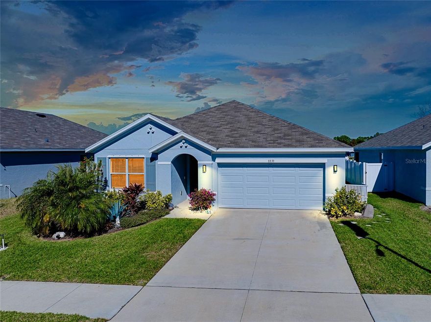 Built in 2022 with solid concrete block construction, this thoughtfully upgraded one-story DR Horton Aria floor plan offers peace of mind and modern comfort.  The open-concept living, dining, and kitchen layout is ideal for everyday living and entertaining.  Tile flooring runs throughout the main areas with carpeted bedrooms for added comfort.  The kitchen features upgraded granite countertops, ample cabinetry, pantry storage, and high quality fixtures, along with blinds and ceiling fans throughout the home.  The spacious primary suite includes dual sinks, his-and-her closets, and a well-appointed bath with large tile finishes. Enjoy outdoor living on the extended covered and screened paver lanai, complete with custom hurricane fabric, upgraded lighting, and a dedicated paver grilling pad—perfect for relaxing or hosting family and friends.  Additional upgrades include whole-yard irrigation with rear drip line, epoxy-coated garage floors, garage overhead storage racks and shelving, plus added laundry room cabinetry to cover all your storage needs.  Located in the gated Glen Creek community, residents enjoy resort-style amenities including a clubhouse, swimming pool, outdoor kitchen, playground, and dog park all included in the impressively low quarterly HOA fees of $275.  Conveniently situated near all that Lakewood Ranch has to offer, including UTC Mall, medical facilities, downtown, beaches, shopping, dining, and schools, with easy access to US-301 and I-75.  Added bonus: Mixon Farm, located directly across the street, has been officially announced as a future public park featuring a library, community gardens, playground, micro-farms, workshops, and ongoing community events at the Pavilion.