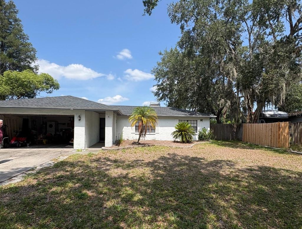 Photo of 23713 Lake Hills Drive, Lutz, FL 33559 (MLS # J990374)