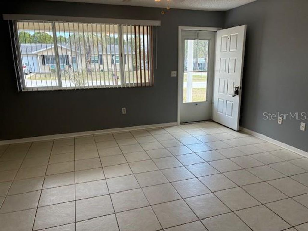 Photo of 10898 SW 88th Court, Ocala, FL 34481 (MLS # OM721255)