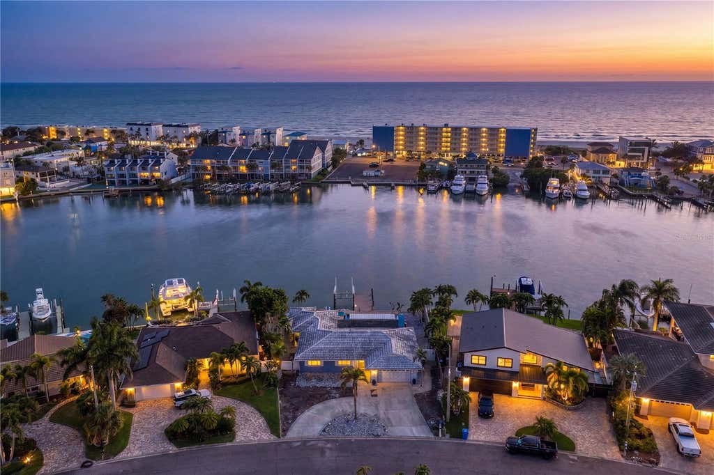 Photo of 10038 S Yacht Club Drive, Treasure Island, FL 33706 (MLS # TB8532610)