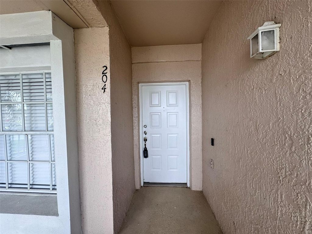 Photo of 13903 Timberland Drive #204, Orlando, FL 32824 (MLS # O6395786)