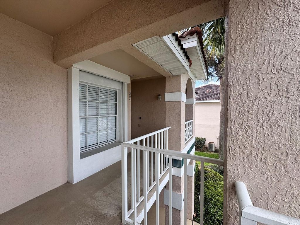 Photo of 13903 Timberland Drive #204, Orlando, FL 32824 (MLS # O6395786)