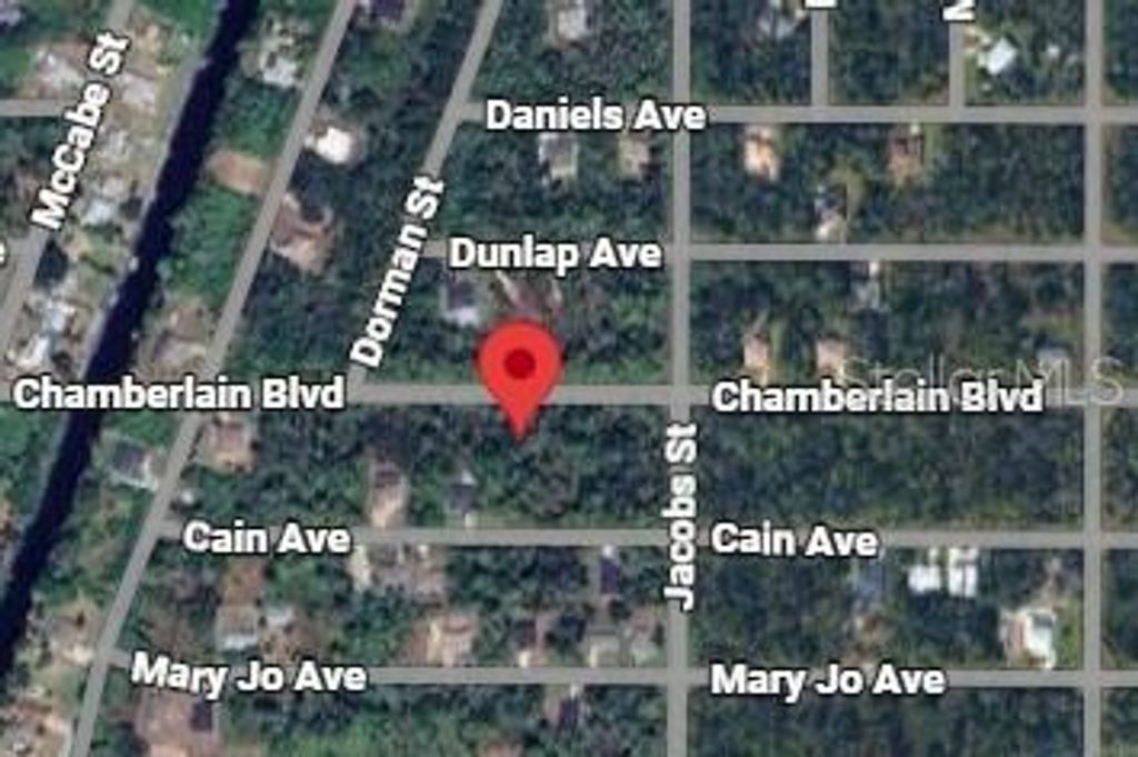 Photo of 13479 Chamberlain Boulevard, Port Charlotte, FL 33953 (MLS # OM717073)