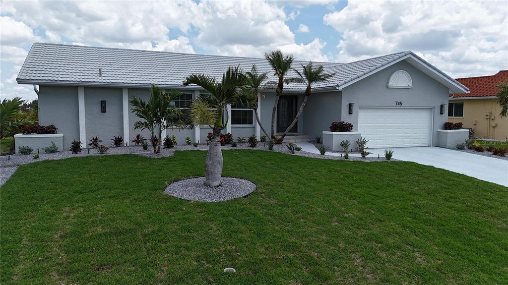 Photo of 745 Monaco Drive, Punta Gorda, FL 33950 (MLS # C7514905)