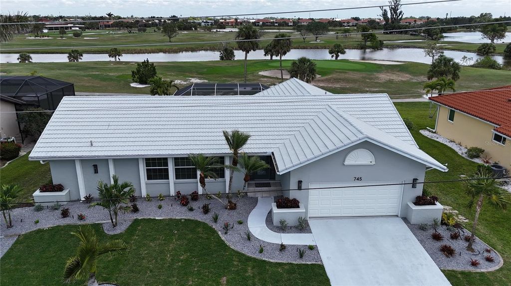 Photo of 745 Monaco Drive, Punta Gorda, FL 33950 (MLS # C7514905)