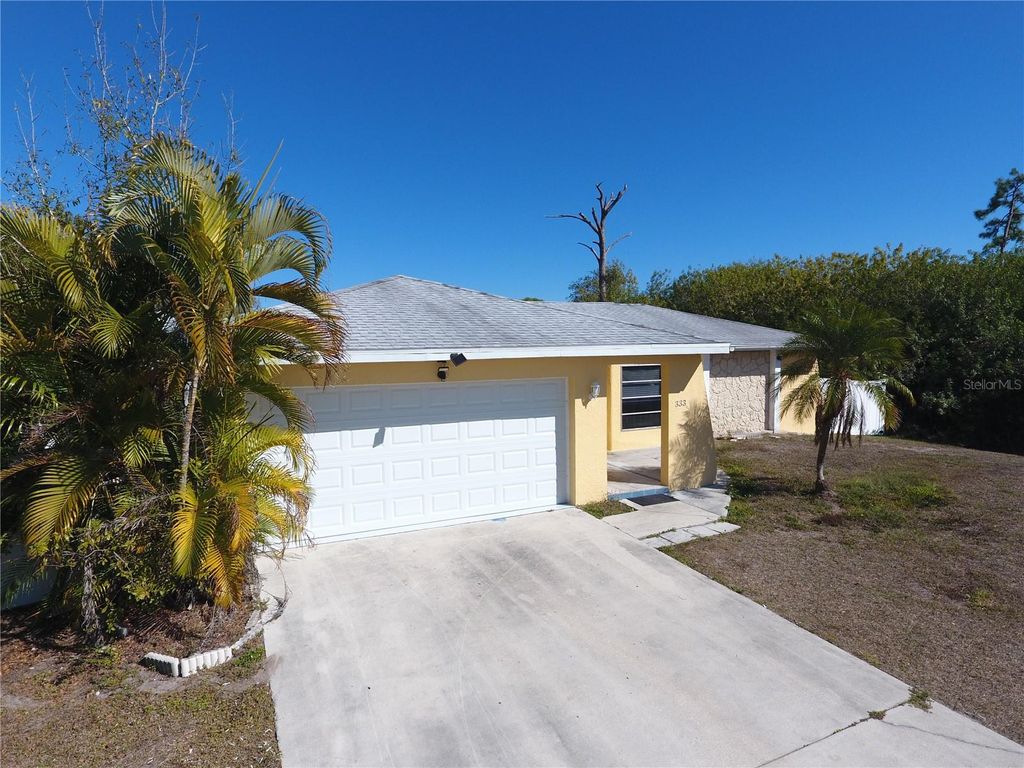 Photo of 333 Millport Street NW, Port Charlotte, FL 33948 (MLS # C7522588)