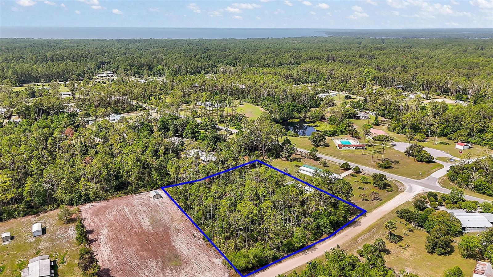 Imagine designing and building your ideal home on this spacious 1.37-acre lot! Nestled near beautiful Lake George and the St. Johns River, this property offers both tranquility and convenience. Zoned R-2 for flexible building options, with no HOA and not located in a flood zone, you’ll have the freedom and peace of mind to make it truly yours.
Don’t just dream it—build it! Contact us today to explore this incredible property.